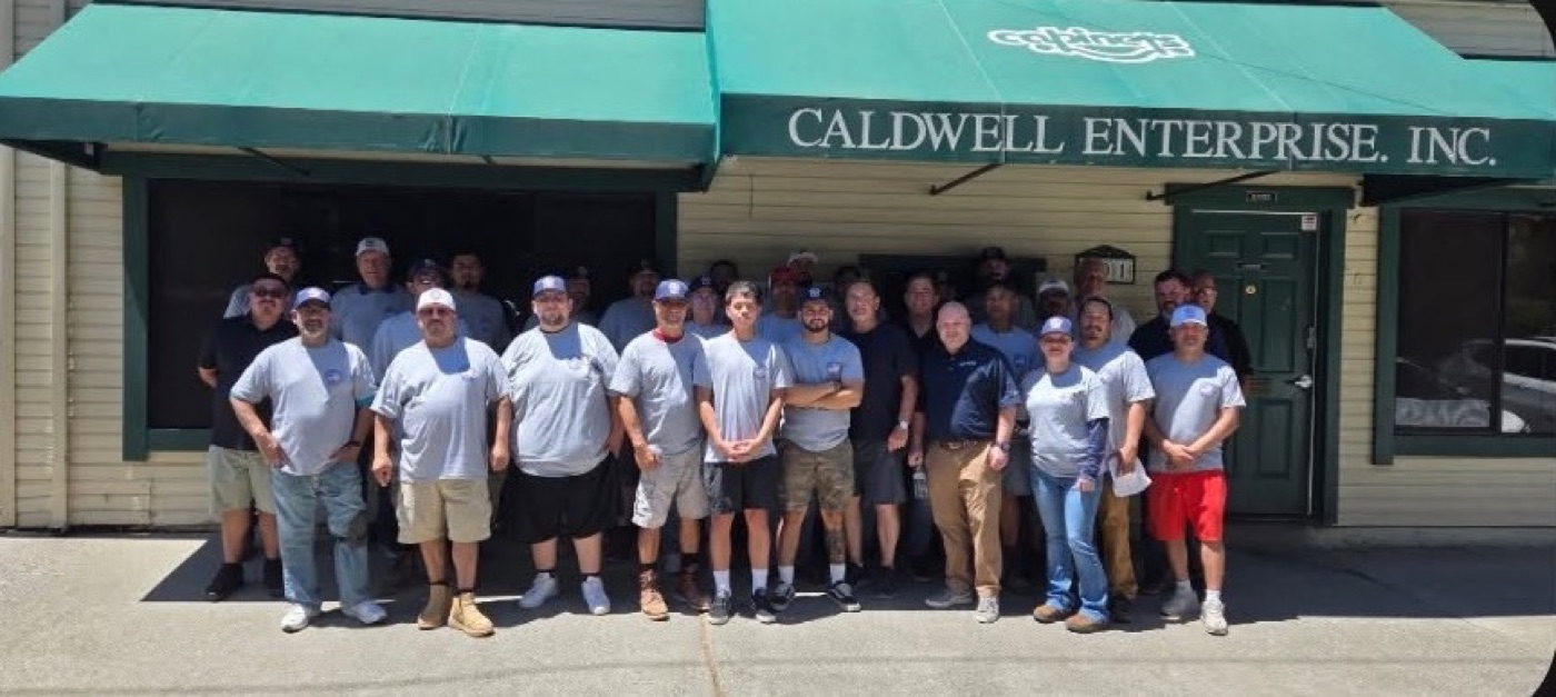 The Caldwell Enterprise team standing outside our Gridley, California shop
